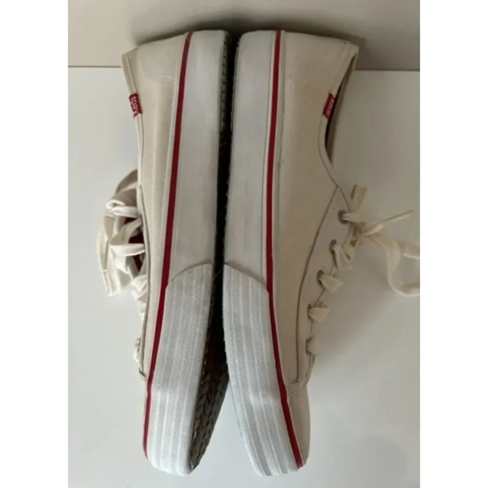 Keds low top canvas lace up sneakers with red trim. Size 8.